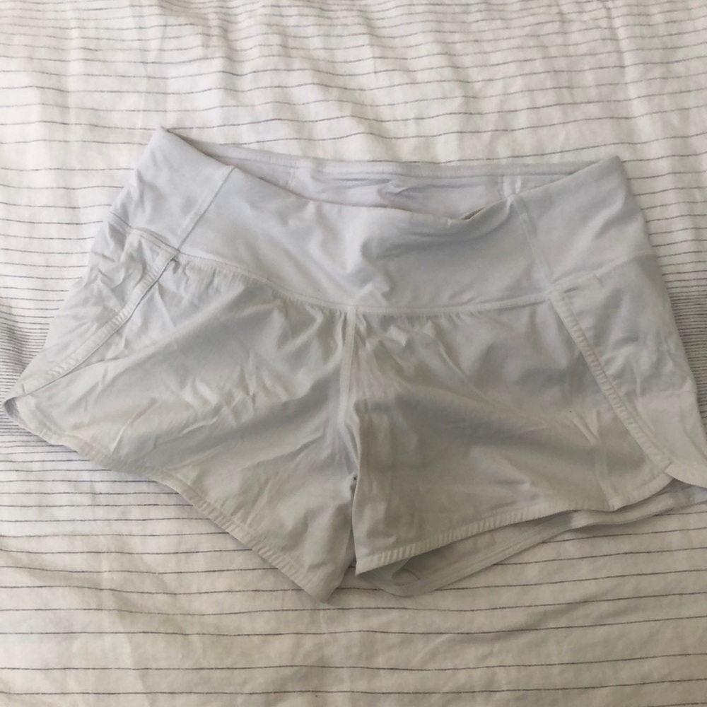 White Lululemon running shorts